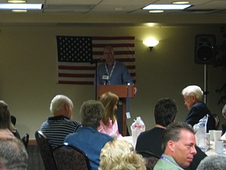 Paul Tewes speaks to the Iowa delegates at their Tuesday morning meeting. Paul Tewes At Iowa Delegation Breakfast (2799900177).jpg