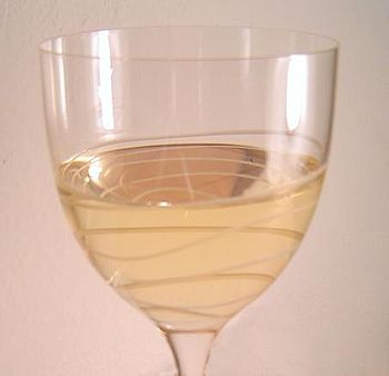 A glass of pinot grigio wine.