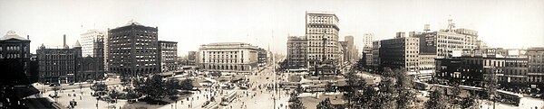 Public Square in 1912, facing east. The Old Stone Church is the third building on the left. The Soldiers' and Sailors' Monument is on the right, in fr