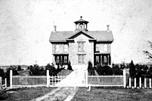 A photograph of the Punchard Free School in 1855, Andover's first public school Punchard Free School 1855.jpg