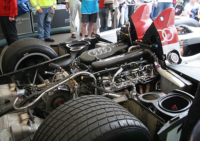 The R10's 5.5 litre V12 TDI diesel engine. The bottom left shows the diesel particulate filters developed by Dow Automotive.