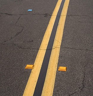 Raised pavement marker safety device