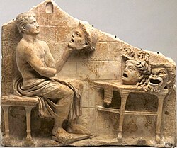 Republican or Early Imperial relief depicting a seating Menander holding the masks of New Comedy (1st century BC - early 1st century AD) Princeton University Art Museum Relief with Menander and New Comedy Masks - Princeton Art Museum.jpg