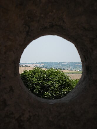 Rocca di Urbisaglia, landscape through an embrasure Rocca di Urbisaglia vista bombardiera2.jpg