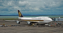 A Singapore Airlines Boeing 747-400, dubbed Megatop, at Auckland Airport, New Zealand. The Megatop was the flagship of the airline from 1989 until the introduction of the Airbus A380 in October 2007 Singapore Airlines SIA 747-412.jpg