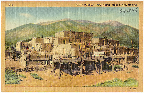 Residential adobe complex, and Taos Mountain pictured on an old postcard, circa 1930-1945.