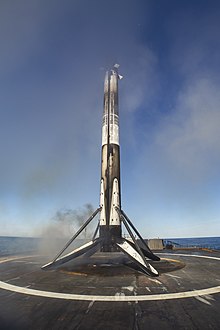 Falcon 9 B1046 standing on Just Read The Instructions after successfully launching and landing three times Spaceflight SSO-A Mission (44460659210).jpg