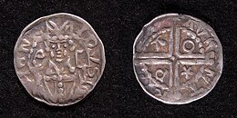 Zilveren penning of denarius (diameter 13 mm) van Hendrik van Vianden als bisschop van Utrecht, geslagen kort na 1250, muntplaats Deventer. De voorzijde toont een gemijterd borstbeeld van de bisschop met staf en missaal. Omschrift: HENR-ICVS. De keerzijde toont een lang kruis met */P/A/O in de kwartieren, omschrift: + D-AVE-NT-RIA.