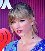 Taylor Swift arriving at the iHeartRadio Music Awards Show in March 2019