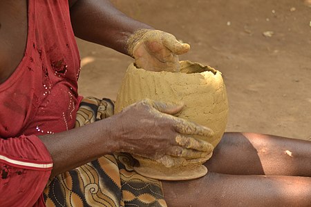 A closer look of the new clay pot being moulded