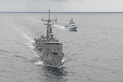 USS Rodney M. Davis alongside KDB Darulaman during CARAT 2014.