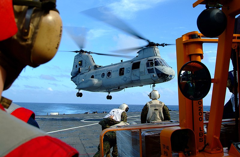 File:US Navy 060219-N-4772B-004 A CH-46E Sea Knight assigned to the Flying Tigers of Marine Medium Helicopter Squadron 262 (HMM-262), lands aboard the dock landing ship USS Harpers Ferry (LSD 49) to pick up a variety of relief suppl.jpg