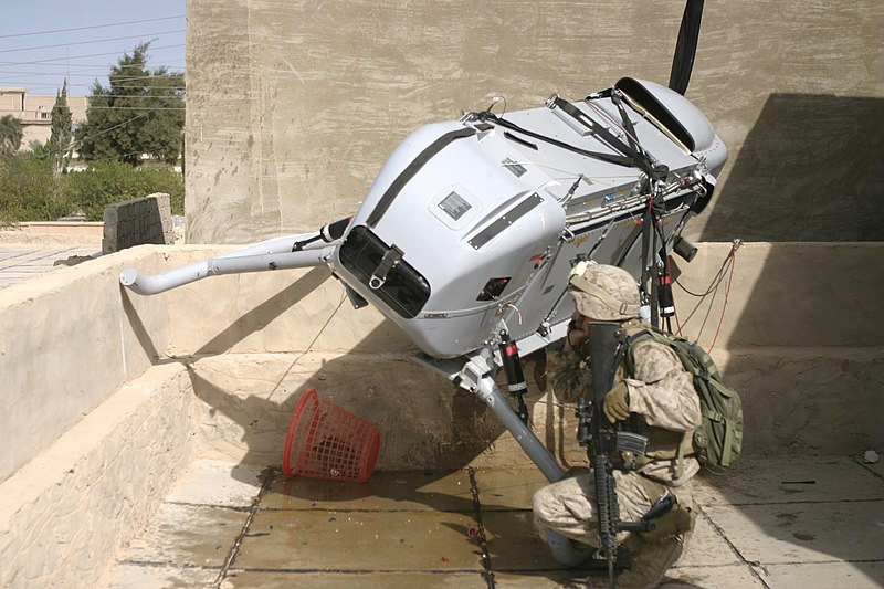 File:US Navy 061103-M-7387J-001 U.S. Marines from Fox Company 2nd platoon 3rd squad secure the site of an unmanned aerial vehicle which crash landed on the roof of a house in the city of Hadithah while recovery issues are organized.jpg