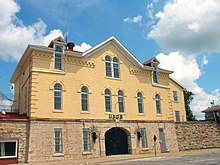 Main gateway into the now-demolished 1877 disciplinary barracks (in 2007). The building now has other uses, including a base eatery. United States Disciplinary Barracks.jpg