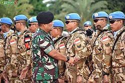 Personnel of the Garuda contingent wear an Indonesian variant of desert Disruptive Pattern Material