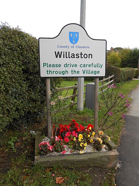 File:Willaston sign and flowerbed, Cheshire East.JPG