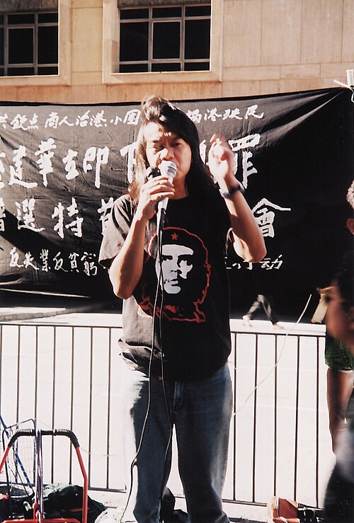 Leung speaking at a protest in 2003