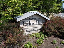 Lake Hills neighborhood sign on the western end of Lake Hills Boulevard. 2018 Lake Hills sign.jpg