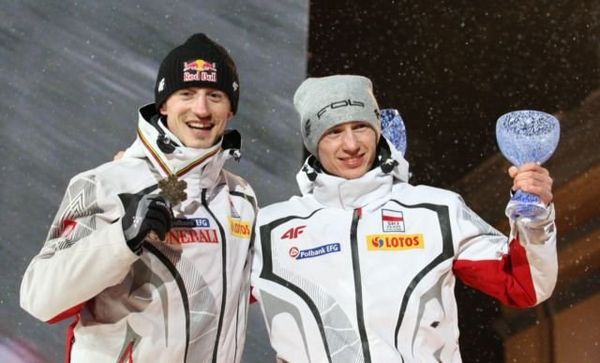 With Adam Małysz during medal ceremony of World Championship 2011