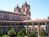 Cloister and church of the Alcobaça Monastery.