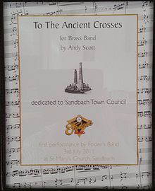 Certificate acknowledging the work "The Ancient Crosses", "a piece composed by Andy Scott as a gift to Sandbach", displayed in the Council Chamber at Sandbach Literary Institution, and referring to the Saxon Sandbach Crosses. Ancient-crosses-dedication-stc-2011.jpg