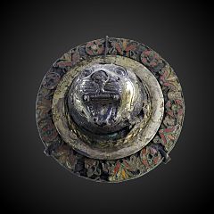 Applique décorée d'une tête de lion