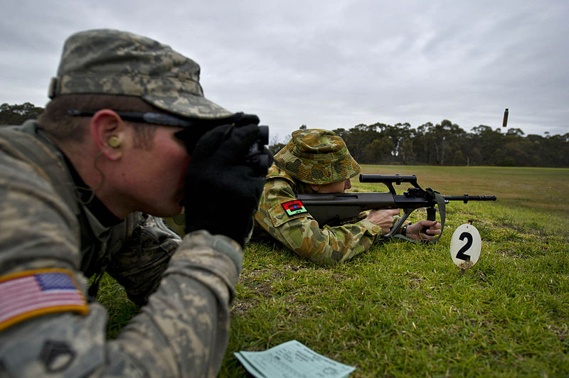 File:Australian army Pvt. Naomi Gangell, right, with the 10th Force Support Battalion, fires at a 300-meter target while U.S. Army Staff Sgt. Aaron Paul, with the 2nd Brigade, 25th Infantry Division, records her 120507-F-MQ656-070.jpg