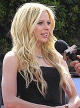 Avril Lavigne's "Complicated" spent nine weeks at number one, which helped it secure its place at the top of the 2002 annual singles chart. In 2007, "Girlfriend" topped the chart for a week. Avrilgfdl.JPG