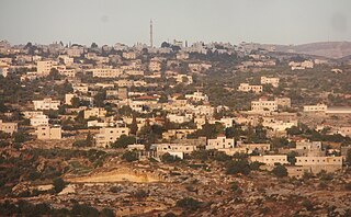 <span class="mw-page-title-main">Bil'in</span> Palestinian village in Ramallah and al-Bireh, State of Palestine