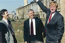 Governor Weld announcing the revival of The Shoe at Cummings Center with Cummings Properties president James McKeown and founder Bill Cummings.