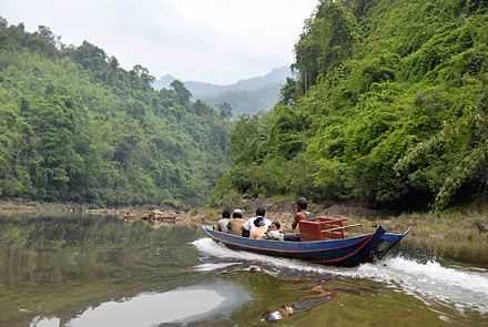 Speedboat barreling down the Nam Ou river