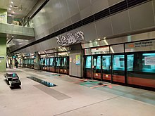 View of one of the station platforms, with one of the reliefs above the platform screen doors