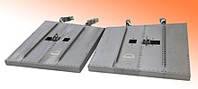 Pair of steering flaps for the NASA X-38. Size: 1.5x1.5x0.15 m; mass: 68 kg each; various components are mounted using more than 400 CVI-C/SiC screws and nuts. CMC-X38-Bodyflaps.jpg