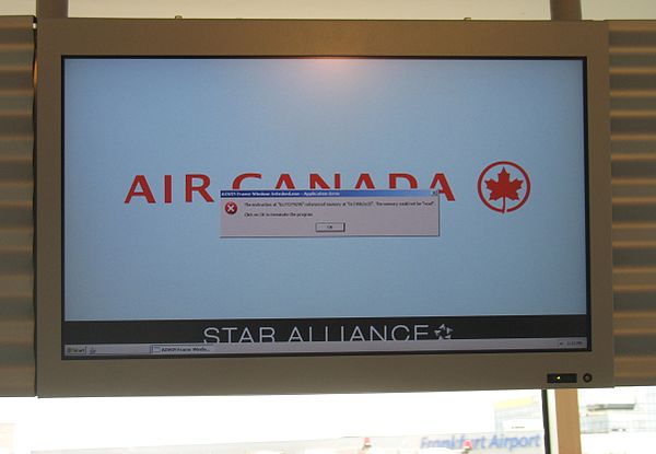 A display at Frankfurt Airport running a program under Windows XP that has crashed due to a memory read access violation