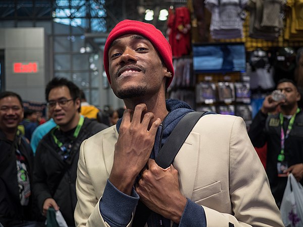 A man at New York Comic Con cosplaying as Tyrone Biggums, a character in the American sketch comedy series Chappelle's Show. Tyrone's character repres