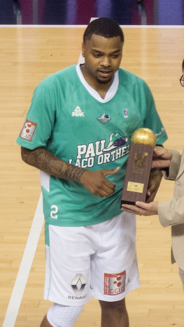 Cooper holding the Pro A MVP Award in 2017.