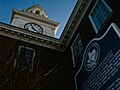 Historical marker and Mahler Student Center clock tower.