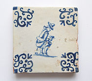 Un recurrente motivo escatológico en el Flandes del siglo XVII, muy popular en la serie del azulejo de oficios de larga tradición en Cataluña.