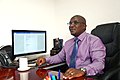Eng.David Luyimbazi in Office.jpg