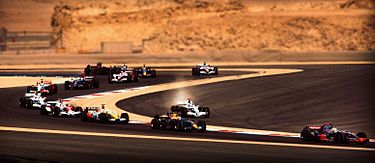 The First lap of the 2008 Bahrain Grand Prix with Jenson Button leaving the track