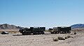 Two Heavy Expanded Mobility Tactical Truck (HEMTT) trucks in Fort Irwin National Training Center in California.}}