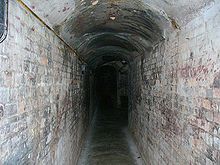 A hidden tunnel leading to the ammunition store below the gun emplacement of Fort Pasir Panjang Fort Tunnel-Singapore.jpg