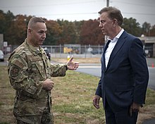 Lamont visiting the Connecticut Air National Guard after the 2019 Boeing B-17 Flying Fortress crash Gov. Lamont honors Bradley ANG Base firefighters (3).jpg