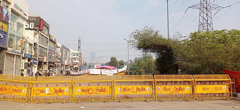 File:Graffiti on police barricades no nrc caa road blocked for protesters who have been sitting for over three weeks in background New Delhi 7 Jan 2020.jpg