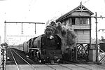 H220 leads the Albury Express out of Melbourne, past the signalbox at Essendon, circa 1949