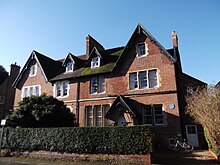 Houses on the west side of Bradmore Road. The right-hand house with a blue plaque is No. 2, home of the author and scholar Walter Pater and his sister Clara Pater, a pioneer of women's education. Houses in Bradmore Road, Oxford.JPG