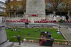 Looking onto poppy crosses and wreathes laid at the Kingston upon Hull Cenotaph on Remembrance Sunday 2023.