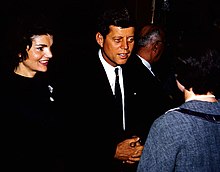 Kennedy with her husband as he campaigns for the presidency in Appleton, Wisconsin, March 1960 Jfk-appleton.jpg