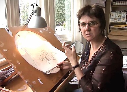 Joanna Quinn in front of her animation desk