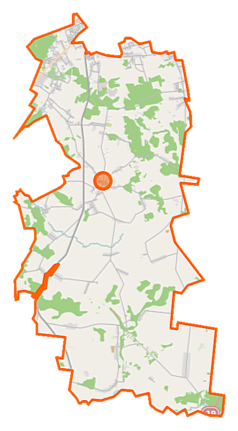 Mapa konturowa gminy Juchnowiec Kościelny, w centrum znajduje się punkt z opisem „Parafia pw.Świętej Trójcyw Juchnowcu”
